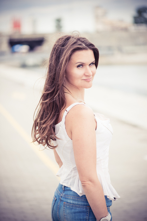 beautiful european woman  with hair flyingの写真素材