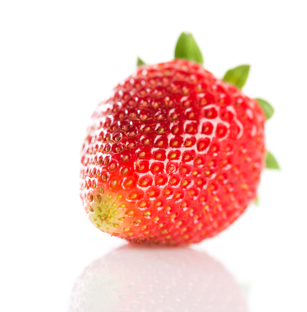 Ripe red strawberries on white background isolatedの写真素材