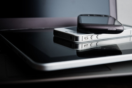 keyboard with two phones and tablet pc