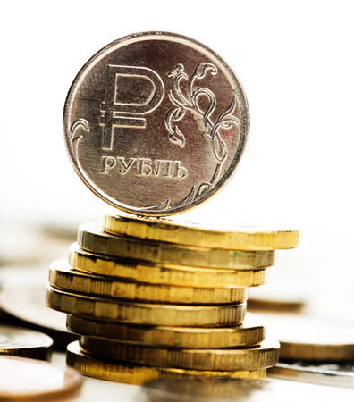 The Russian rouble coin and gold money on the deskの写真素材