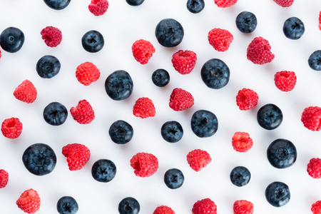 Fresh blueberries and raspberries, top view