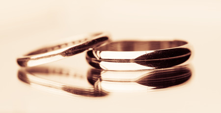 Two gold wedding rings closer-upの写真素材
