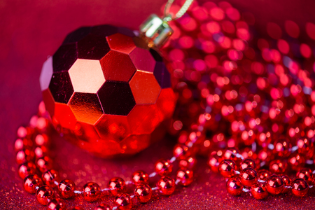 red christmas balls on glitter backgroundの写真素材