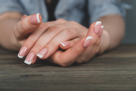 Woman hands with french manicureの写真素材