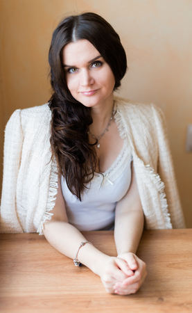Portrait of an attractive fashionable young brunette woman.の写真素材