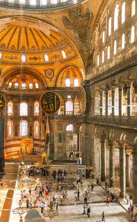 ISTANBUL, TURKEY - AUGUST 23 2013: People are visiting Ayasofya Museum. Hagia Sophia is former Orthodox patriarchal basilica, later a mosque and now a museum.のeditorial素材