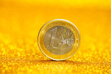 One euro coin over abstract backgroundの写真素材