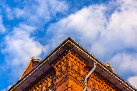 The building of the Byzantine style is made of bricks, decorated in the traditions of Russian folk architecture, against the background of the sunny sky. Moscow, Russia.の写真素材