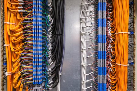 Low-voltage cabinet, non-combustible cable for a fire alarm system. Connected the cable through the...