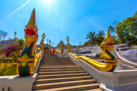 White stone Buddhist temple on the edges. Wat Kaew, Krabi Town, Thailand - Februrary 2014.