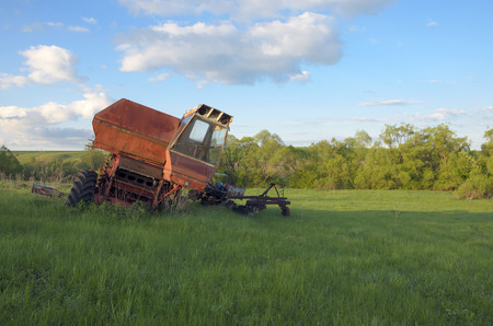 Abandoned combine-harvesterの写真素材