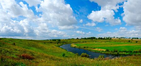 Beautiful panoramic landscape with river and hills
