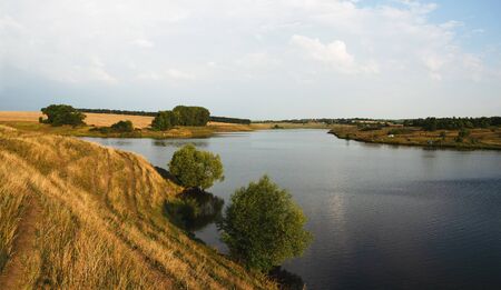 Sunny landscape with river