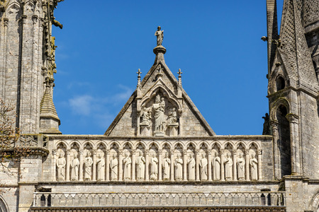 Chartres, France - April 19, 2013: Group of sculptures above Royal Portal of Cathedral Our Lady of Chartres, France - one of the finest examples of French Gothic architecture, constructed during the 13th century.のeditorial素材