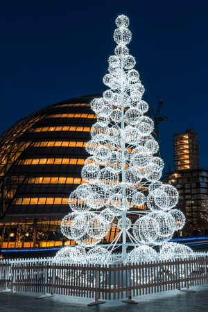 London, United Kingdom - January 2, 2015: Christmas tree at London City Hall as seen on 2nd of January, 2015.のeditorial素材