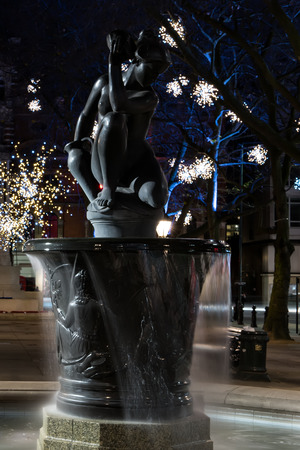 London, United Kingdom - December 24, 2014: London Christmas lights decoration as seen at Venus Fountain in Sloan Square on 24th of December, 2014.のeditorial素材