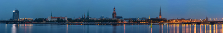 Riga, Latvia - October 17, 2015: Panoramic view across river of Riga, Latvia as seen at night 17th of October, 2015.のeditorial素材