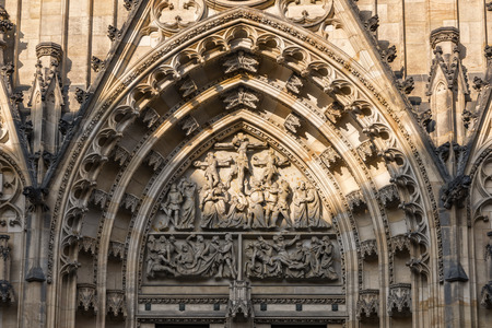 Prague, Czech Republic - May 26, 2016: Close up view of central tympanun with Passion scene at Metropolitan Cathedral of Saints Vitus, Wenceslaus and Adalbert.のeditorial素材