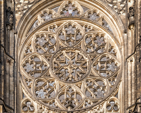 Prague, Czech Republic - May 26, 2016: Close up view of rose window at Metropolitan Cathedral of...