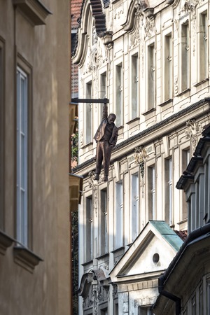 Prague, Czech Republic - May 28, 2016: View of street in old town and the Hanging Man sculpture dedicated to Sigmund Freid made by sculptor David Cerny.のeditorial素材