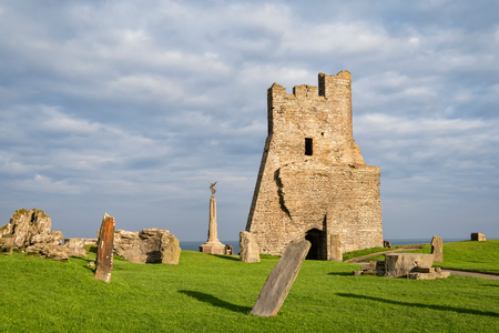 Aberystwyth, Wales, United Kingdom - September 21, 2016: View of remains of the north tower gateway at Aberystwyth Castle. Building work started in 1277 at the time of the First Welsh War. War Memorial is visible on background.のeditorial素材