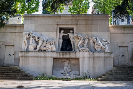 Paris, France - April 18, 2015: View of the monument aux morts at Pere Lachaise cemetery in Paris. Pere Lachaise cemetery, the first garden cemetery in Paris, the world's most visited cemetery.のeditorial素材