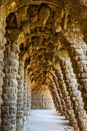 Barcelona, Spain - September 24, 2015: View of Colonnade by architect Antoni Gaudi at Park Guell in...