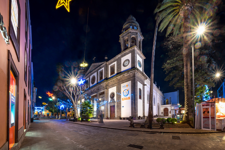 San Cristobal de La Laguna, Tenerife, Spain - December 8, 2017: Cathedral de Nuestra Senora de los Remedios at night within Christmas street decoration.のeditorial素材