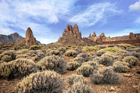 View of rocks within volcanic caldera at Canadas del Teide, Tenerife. Copy space in sky.の写真素材