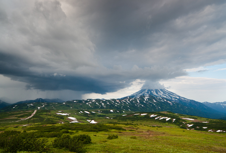 storm front has changed the weather in the area Vilyuchinsky volcano, Kamchatka Peninsulaの写真素材