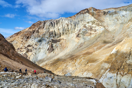 Walking route in the crater of the active volcano Mutnovsky on the Kamchatka Peninsula. Canyon at the entrance to the caldera of the volcano.の写真素材