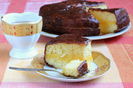 Sponge Cake with Lemon Cream and Chocolate Glazeの写真素材