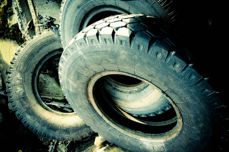 Stack of old used rubber tiresの写真素材