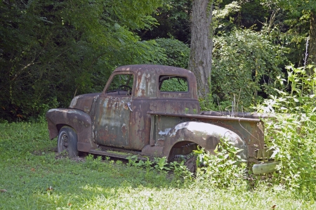 An old pick up truck that has sat untouched for too longの写真素材