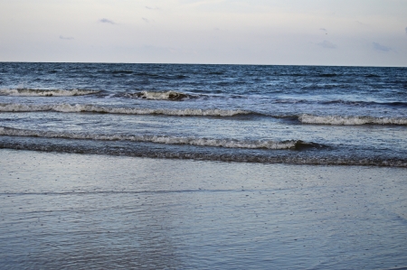 The waves coming into the beachの写真素材