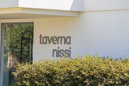 AGIA NAPA, CYPRUS - MAY 26, 2019: Entrance to the Taverna Nissi at the Nissi Beach, Ayia Napaのeditorial素材