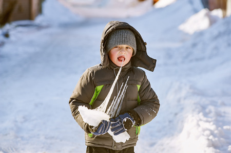 Gay boy on a winter walk in the Parkの写真素材