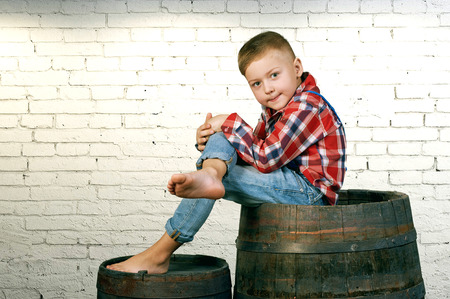 portrait of a beautiful boy . Stylish boy posing . the concept of children's fashionの写真素材