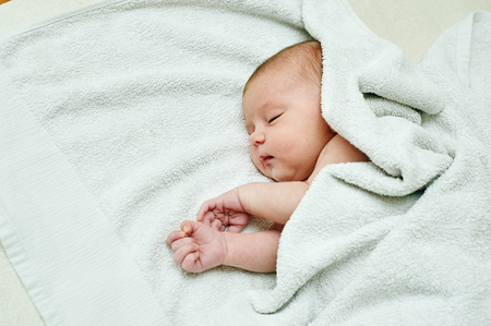 portrait of a newborn girl . Sleeping , close-upの写真素材