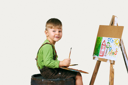 A little boy draws a picture .Preschool educationの写真素材
