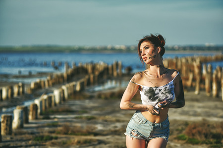 Dirty girl in a dirty t-shirt .の写真素材