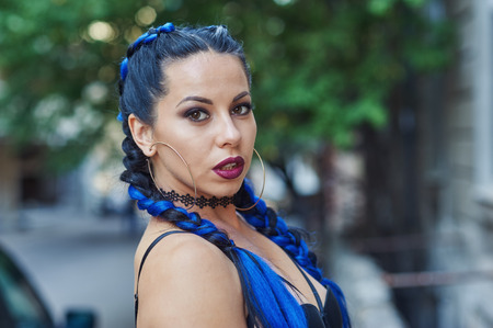 portrait of a young fashionable woman in the cityの写真素材