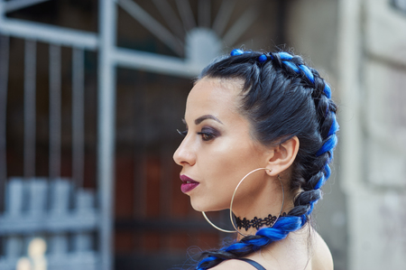 portrait of a young fashionable woman in the cityの写真素材
