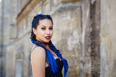 portrait of a young fashionable woman in the cityの写真素材