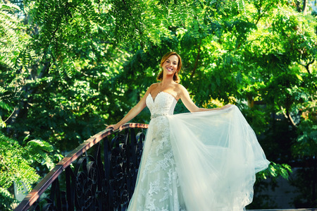 Portrait of the bride . Young woman in wedding dress on wedding day