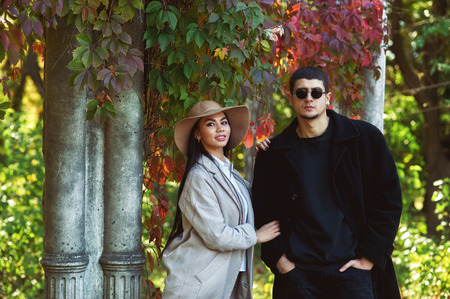 Fashionable young couple in love in the old townの写真素材