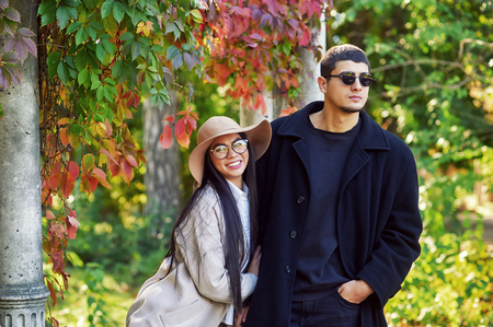 Multi-ethnic couple in love on a walk in the Parkの写真素材