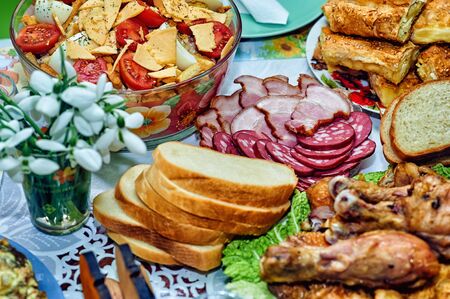 Delicious homemade food on the table . Variety of home-made dishes