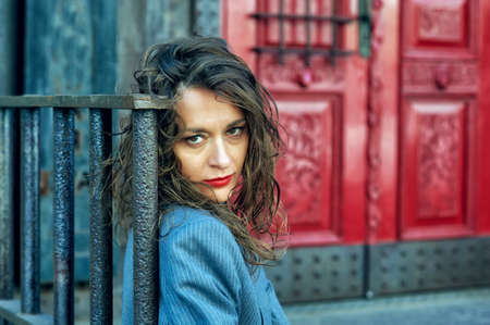 Portrait of a young stylish woman in the city