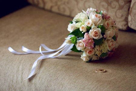 bridal bouquet and wedding ringsの写真素材